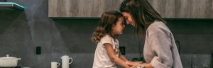 woman and child in new home kitchen